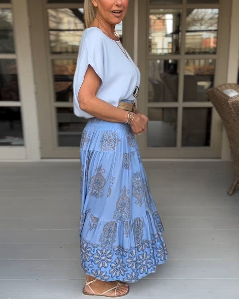 Spódnica z kwiatowymi panelami i zakładkami