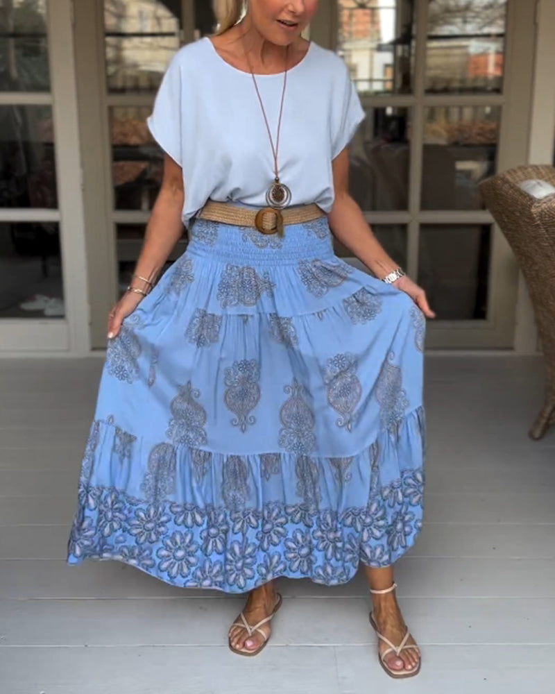 Spódnica z kwiatowymi panelami i zakładkami