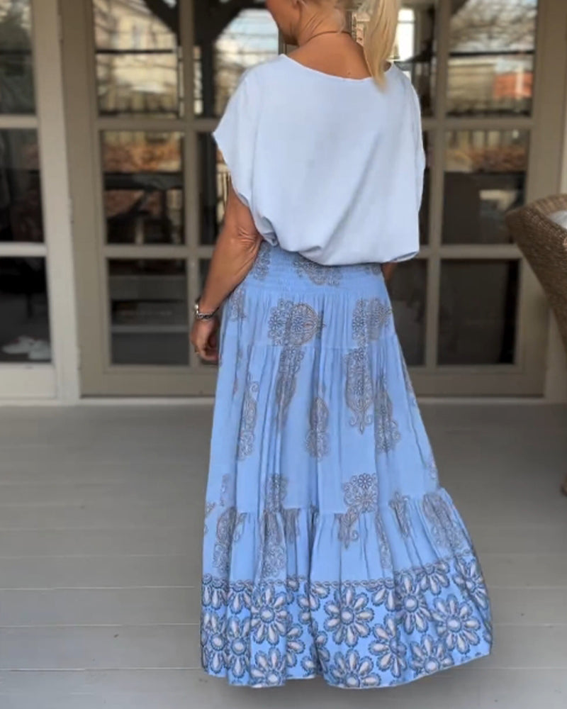 Spódnica z kwiatowymi panelami i zakładkami