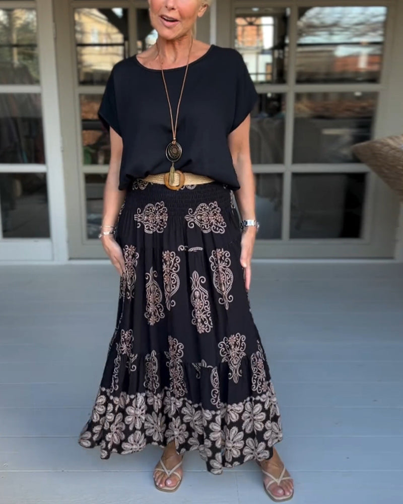 Spódnica z kwiatowymi panelami i zakładkami