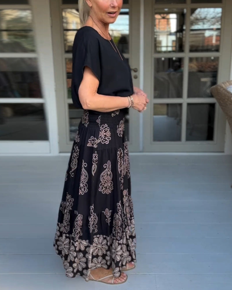 Spódnica z kwiatowymi panelami i zakładkami