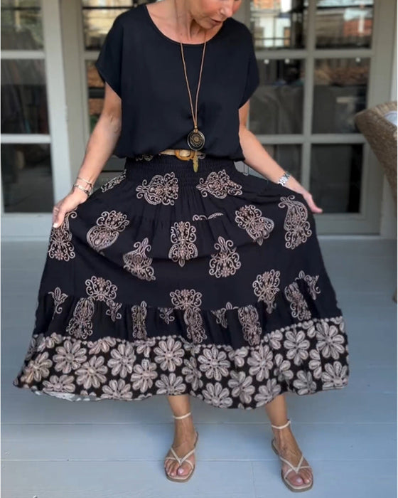 Spódnica z kwiatowymi panelami i zakładkami