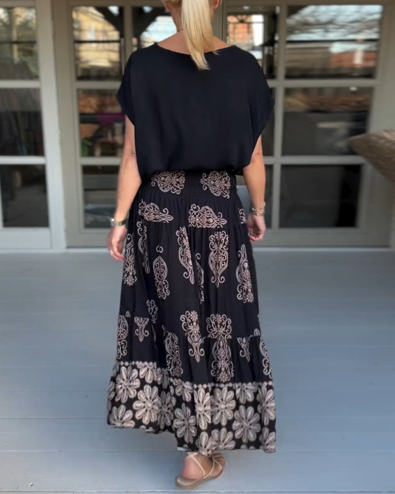 Spódnica z kwiatowymi panelami i zakładkami