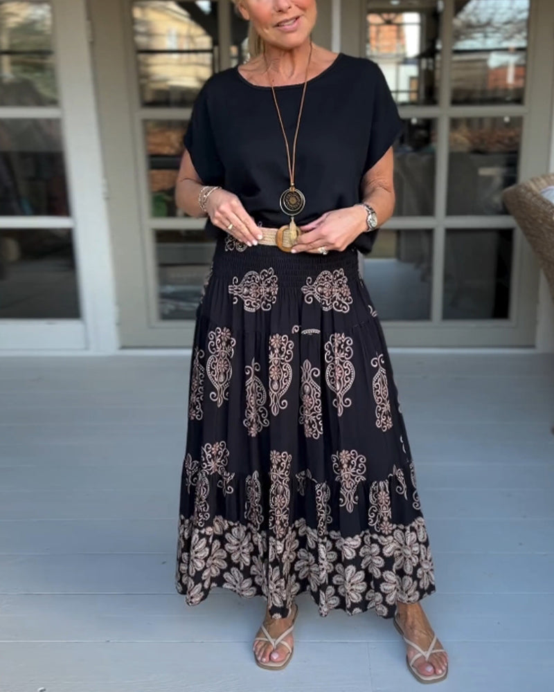 Spódnica z kwiatowymi panelami i zakładkami