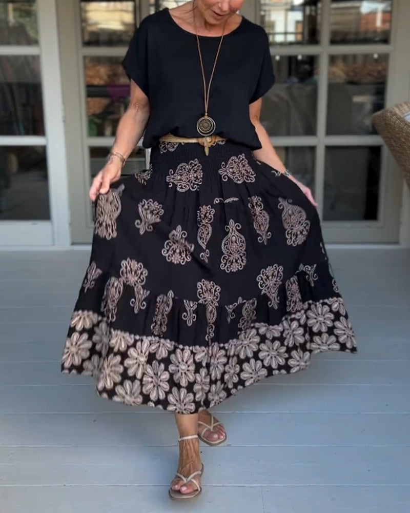 Spódnica z kwiatowymi panelami i zakładkami