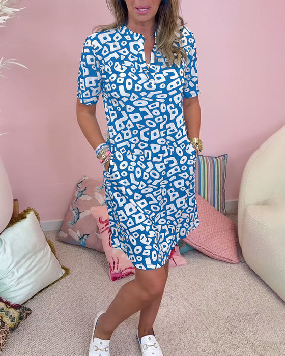 Sukienka z kieszeniami i dekoltem w kształcie litery V