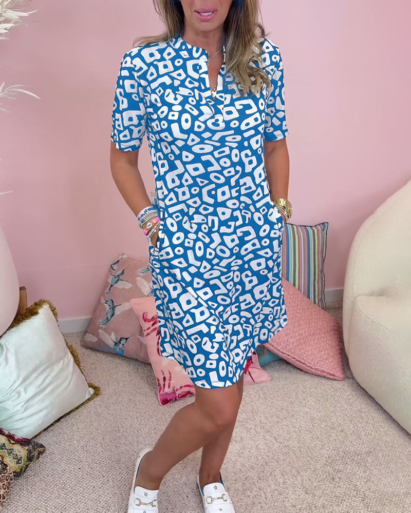 Sukienka z kieszeniami i dekoltem w kształcie litery V