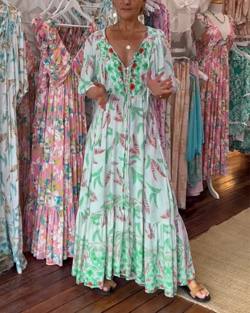 Damska sukienka maxi z dekoltem w kształcie litery V i nadrukiem w liście