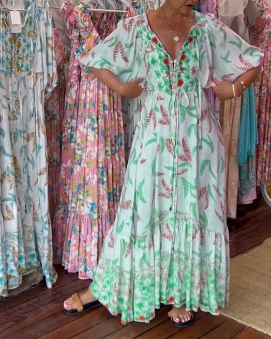 Damska sukienka maxi z dekoltem w kształcie litery V i nadrukiem w liście