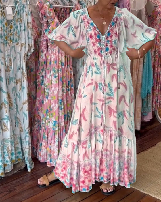 Damska sukienka maxi z dekoltem w kształcie litery V i nadrukiem w liście