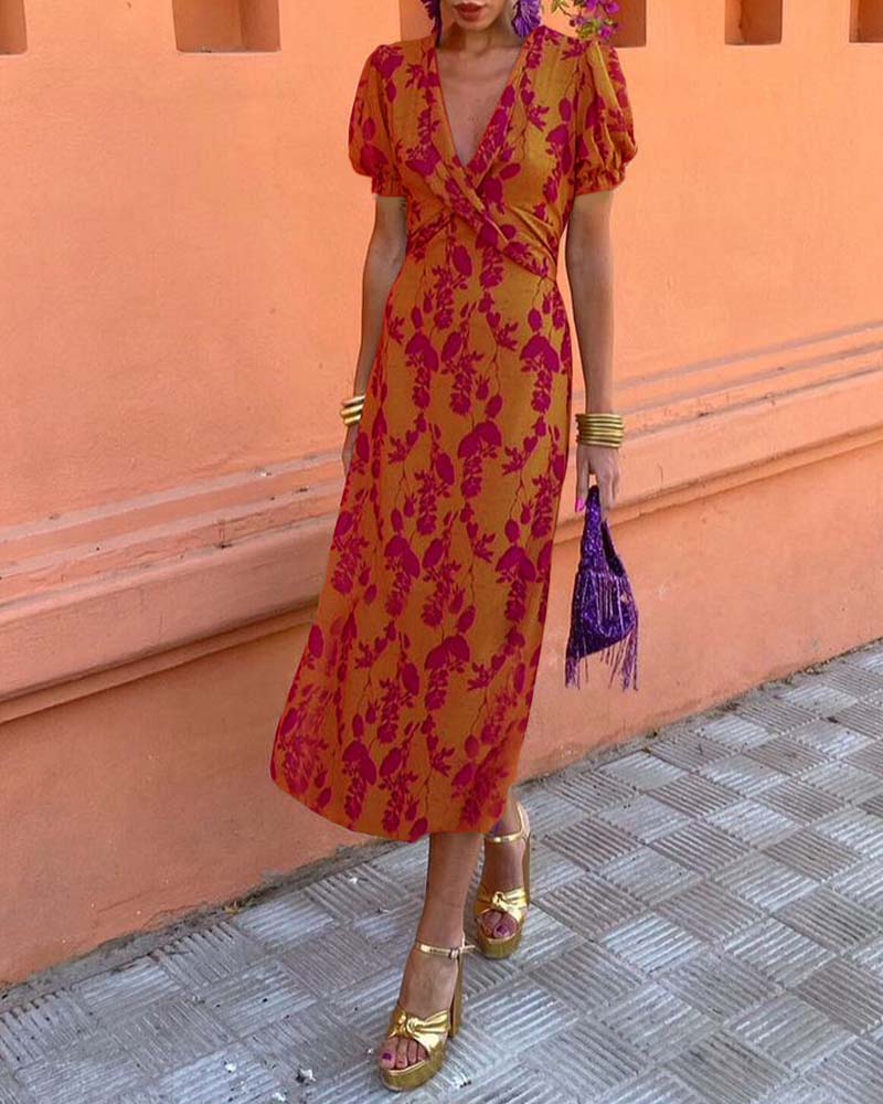 Elegancka sukienka w kształcie liścia z głębokim bufiastym rękawem i dekoltem w kształcie litery A