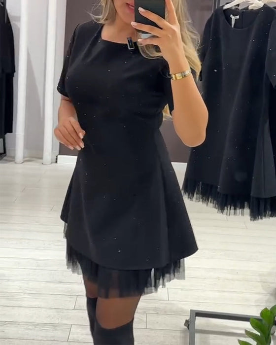 Sukienka z elegancką, mieniącą się siateczką patchworkową