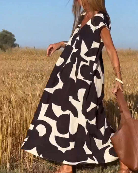 Sukienka z nadrukiem i dekoltem V