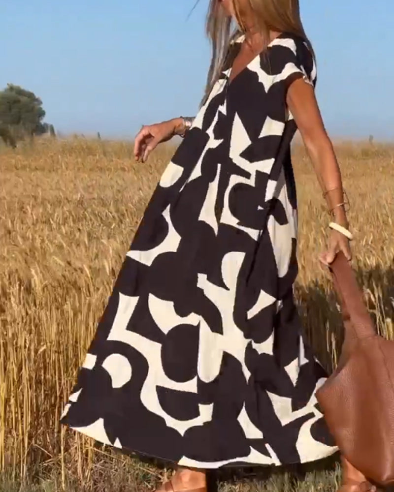 Sukienka z nadrukiem i dekoltem V