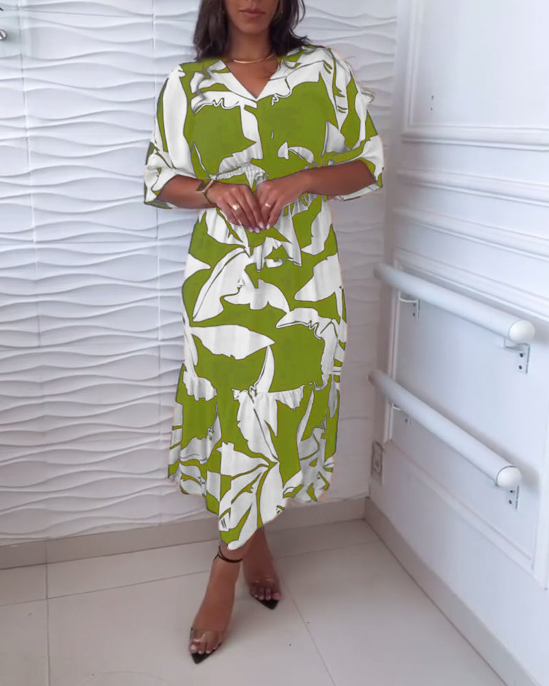 Elegancka sukienka z dekoltem w kształcie litery V i rękawami trzy czwarte