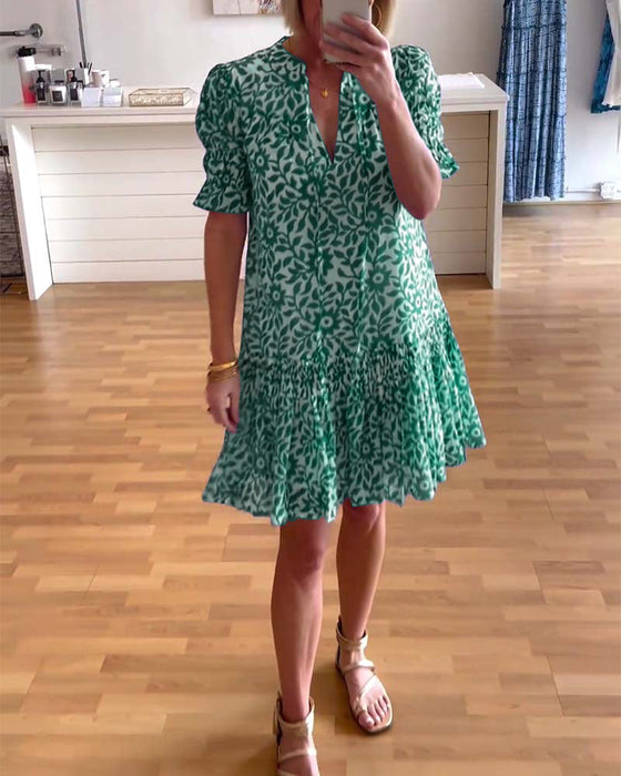 Sukienka z bufiastymi rękawami i kwiatowym nadrukiem