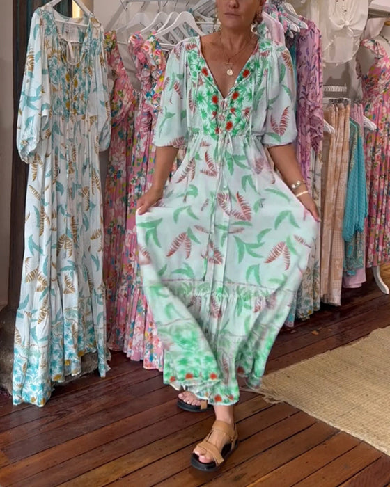 Damska sukienka maxi z dekoltem w kształcie litery V i nadrukiem w liście