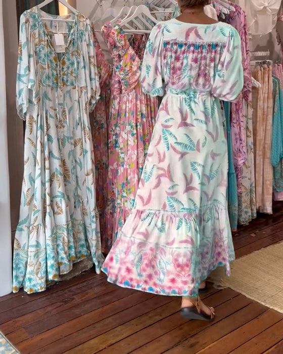 Damska sukienka maxi z dekoltem w kształcie litery V i nadrukiem w liście