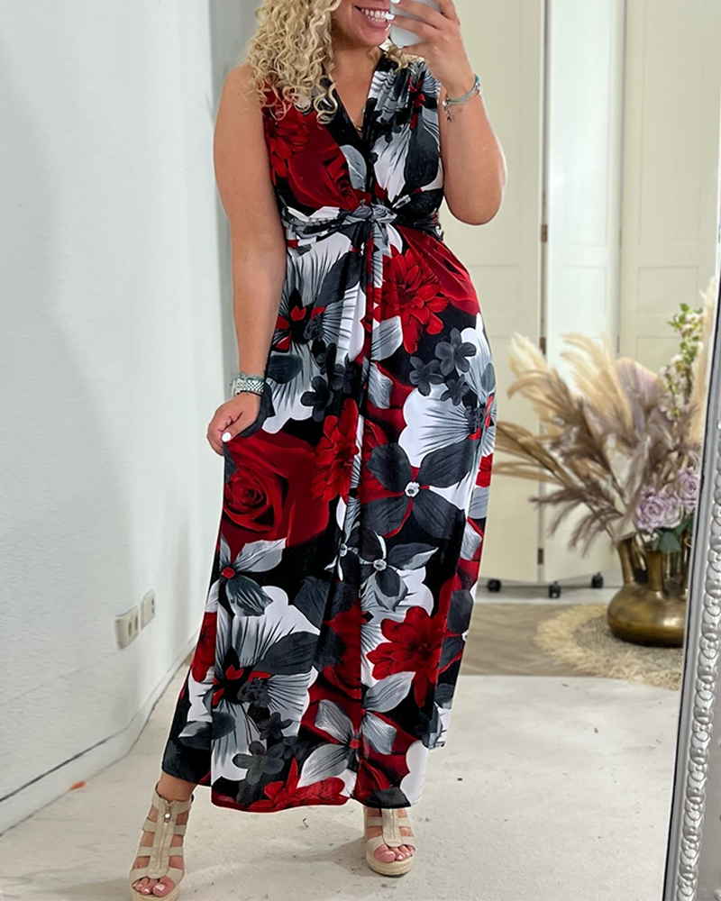 Elegancka plisowana sukienka bez rękawów w kwiatowy wzór