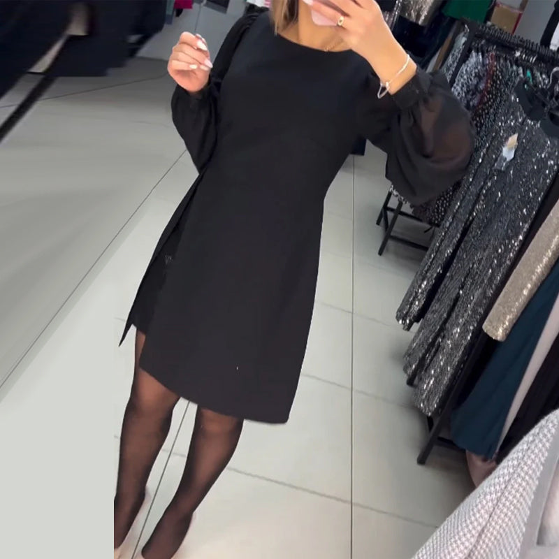 Elegancka sukienka w jednolitym kolorze