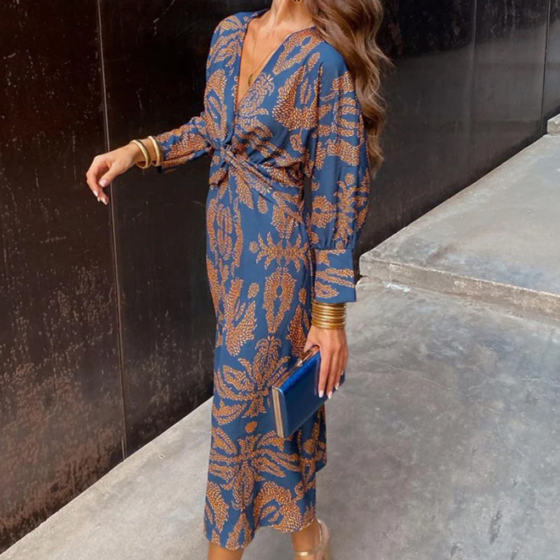 Elegancka sukienka w stylu vintage z dekoltem w kształcie litery V i długim rękawem