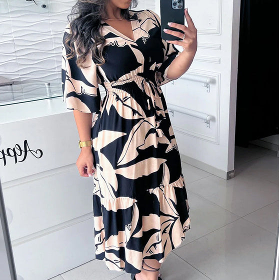 Elegancka sukienka z dekoltem w kształcie litery V i rękawami trzy czwarte