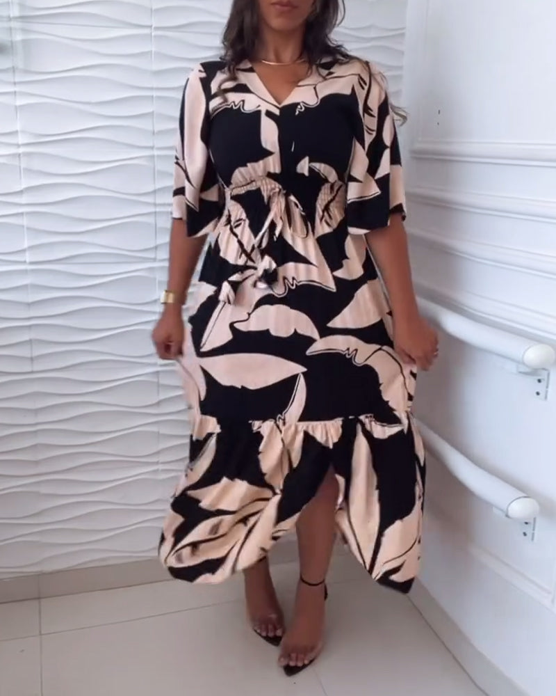 Elegancka sukienka z dekoltem w kształcie litery V i rękawami trzy czwarte