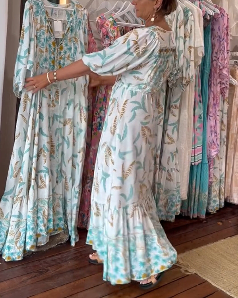 Damska sukienka maxi z dekoltem w kształcie litery V i nadrukiem w liście