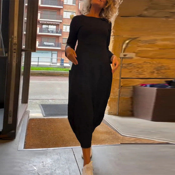 Jednokolorowa sukienka z okrągłym dekoltem i długimi rękawami